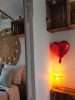 Łóżko lub łóżka w pokoju w obiekcie La loveroom de l'Artois