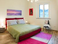 Posteľ alebo postele v izbe v ubytovaní Agriturismo Casa Rosa