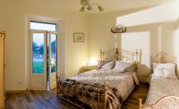 Posteľ alebo postele v izbe v ubytovaní Agriturismo Casa Rosa