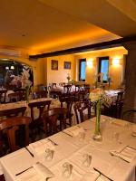 Reštaurácia alebo iné gastronomické zariadenie v ubytovaní Agriturismo Il Pozzo