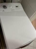 a white stove top oven sitting in a kitchen at Appartement neuf entièrement équipé proche centre in Amiens