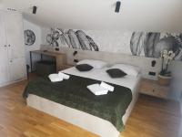 Posteľ alebo postele v izbe v ubytovaní MEMORI bed&breakfast