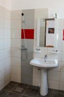 a bathroom with a sink and a shower at Hotel Atlantis in Eforie Nord