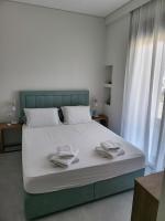 Posteľ alebo postele v izbe v ubytovaní Olea Valley Villa T2