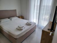 Posteľ alebo postele v izbe v ubytovaní Olea Valley Villa T2