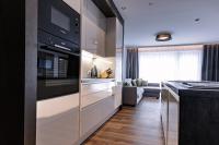 A kitchen or kitchenette at DAS MORITZ- Fine Living Apartments