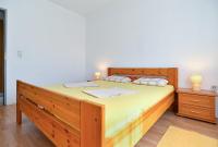 Postel nebo postele na pokoji v ubytování Apartments Stefko 2071