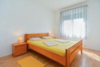 Postel nebo postele na pokoji v ubytování Apartments Stefko 2071