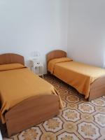 A bed or beds in a room at The Garden