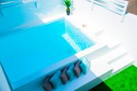 Bazén v ubytování Vibesol Pool Heated House nebo v jeho okolí