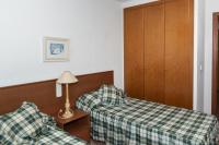 Postel nebo postele na pokoji v ubytování Florazar 2, Vi-10-B