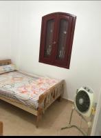 Postel nebo postele na pokoji v ubytování شاليه مكيف بقريه الأندلسيه