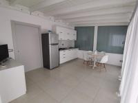 A kitchen or kitchenette at Mary Vi Rooms