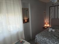 Postel nebo postele na pokoji v ubytování Dimitra Apartments