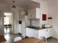 Kuchyňa alebo kuchynka v ubytovaní Villa Le Printemps, maison 15 pers avec piscine