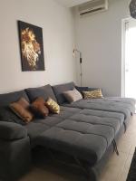 Posteľ alebo postele v izbe v ubytovaní le J&J Appartement spacieux climatisé en centre ville