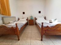 Posteľ alebo postele v izbe v ubytovaní Zennova #22 Nikiti Sea Side House