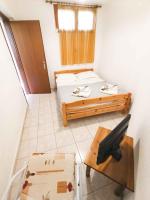 Posteľ alebo postele v izbe v ubytovaní Zennova #22 Nikiti Sea Side House