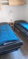 Posteľ alebo postele v izbe v ubytovaní Mobilhome Bora Bora 2018 Camping Les Pierres Couchées Saint Brevins les Pins