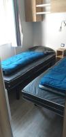 Posteľ alebo postele v izbe v ubytovaní Mobilhome Bora Bora 2018 Camping Les Pierres Couchées Saint Brevins les Pins