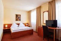 Postel nebo postele na pokoji v ubytování Hotel Zlatá Hvězda