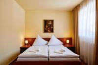 Postel nebo postele na pokoji v ubytování Hotel Zlatá Hvězda