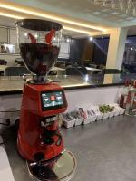 a red blender sitting on top of a counter at Hotel FOCUS in Prilep