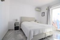 A bed or beds in a room at Ladera Panorama 25