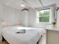 Postel nebo postele na pokoji v ubytování Holiday Home Hagbard - 2-6km from the sea by Interhome