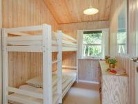 Postel nebo postele na pokoji v ubytování Holiday Home Hagbard - 2-6km from the sea by Interhome