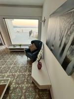 Posezení v ubytování Finestra sul mare