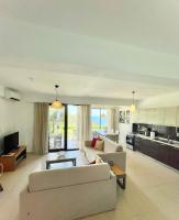 A television and/or entertainment centre at Koumaros Villas