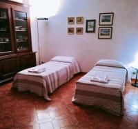 Postel nebo postele na pokoji v ubytování B&B "Madama Granèt"