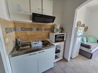 A kitchen or kitchenette at Standart Apartments , Glyfada Beach