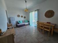 A bed or beds in a room at Standart Apartments , Glyfada Beach