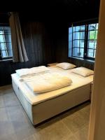 Cama ou camas em um quarto em Ny kvalitetshytte-158 m2-Kikut!