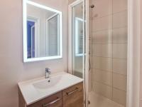 a bathroom with a sink and a shower at Cosy&#39;Appart - LE SAINT MAUR in Rouen