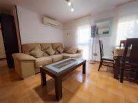 Posezení v ubytování APARTAMENTO AL-ALBA