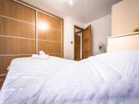 Postel nebo postele na pokoji v ubytování APARTAMENTO AL-ALBA