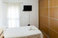 Postel nebo postele na pokoji v ubytování APARTAMENTO AL-ALBA