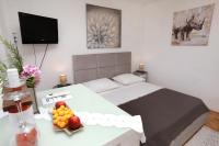 Posteľ alebo postele v izbe v ubytovaní Apartments ITD
