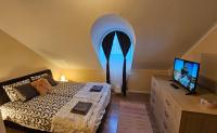 Posteľ alebo postele v izbe v ubytovaní Lucsony Apartman
