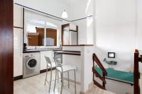 Kuchyň nebo kuchyňský kout v ubytování Villa Florencia