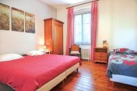 Łóżko lub łóżka w pokoju w obiekcie Villa Rosella