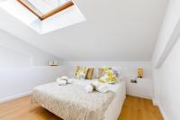 Posteľ alebo postele v izbe v ubytovaní Duplex Haven