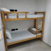 Ein Bett oder Betten in einem Zimmer der Unterkunft SPNI Eilat Field School