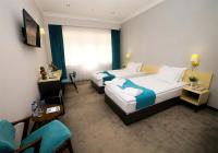 Khiva Residence Hotelにあるベッド