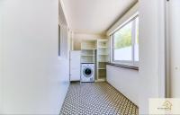 a laundry room with a washing machine and a window at Le Mykonos¶ Gare¶ 2Garages ¶Jardin ¶Spacieux in Grenoble