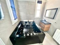 a kitchen with a sink and a counter top at Palais Hervé in Cannes