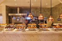 a bakery with many different types of pastries on display at TRS Ibiza Hotel - Adults Only in San Antonio